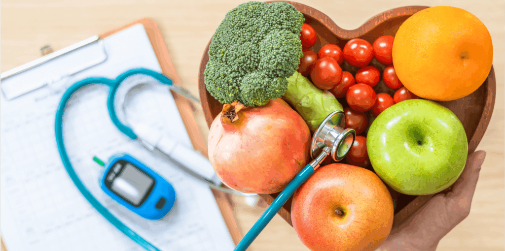 A person holding a stethoscope and a bowl of fruits and vegetables, promoting a healthy lifestyle.